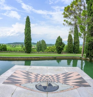 Horizontal sundial and pond in Parco Giardino Sigurtà, Valeggio sul Mincio, Province of Verona,