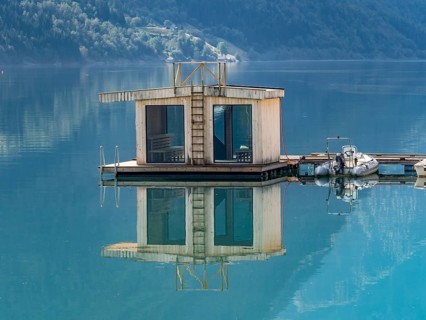 Floating sauna, village Fjaerland at the Sognefjord, Norway, Europe