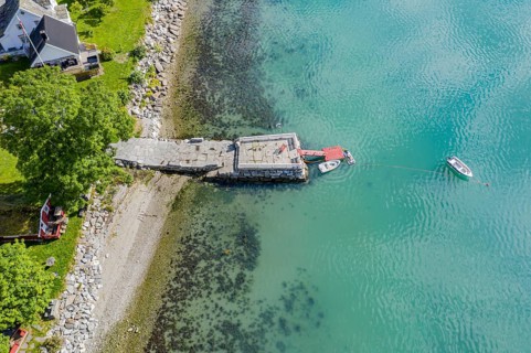 Campsite at the Sognefjord with pier for leisure boat, aerial view, Lustrafjord, Norway, Europe