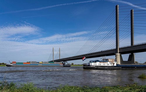 Cargo ships on the Rhine near Rees, Rhine bridge Rees-Kalkar, road bridge, federal road B67, North