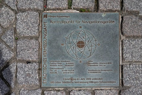 Checkpoint for navigation devices, metal plate lasered into the road, Villingen-Schwenningen,