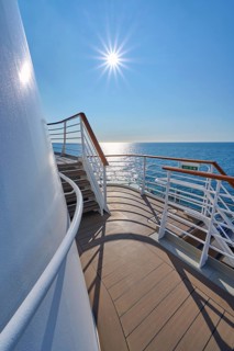 View from the deck of a cruise ship Mein Schiff 6 to the sunny sea and clear sky, North Sea,