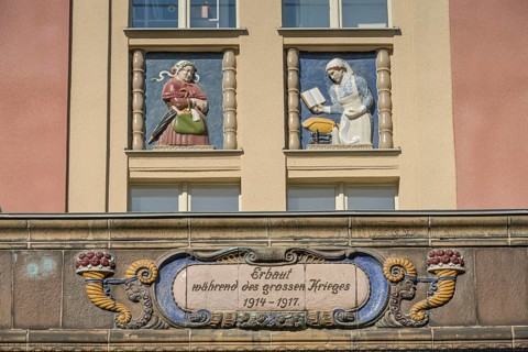 Midwives, relief on old building, former woman's and children's clinic, today St. Marien