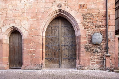 Old town hall in the old town centre, sandstone façade, wooden gates. Miltenberg, Lower Franconia,