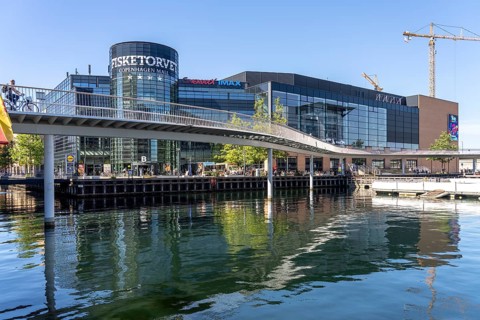 Cycle bridge Cykelslangen and the Fisketorvet Copenhagen Mall at the harbour of Copenhagen,