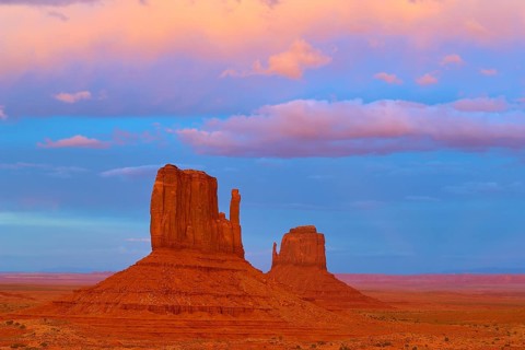 Monument Valley with majestic red sandstone formations in the desert, in sunlight, Monument Valley