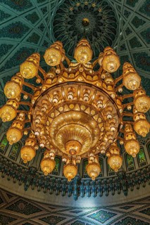 Dome and illuminated chandelier in the Sultan Qaboos Mosque, Muscat, Arabian Peninsula, Sultanate