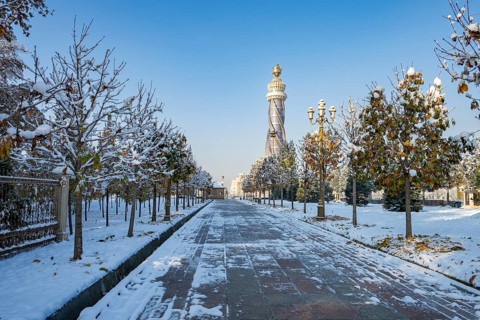 Winter park with Istiklol Tower, Independence and Freedom Tower, Dushanbe, Tajikistan, Central