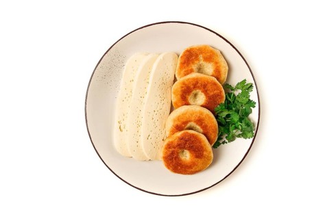 Mchadi, corn tortillas, traditional Georgian dish, corn bread, with Imeretian cheese, homemade, no