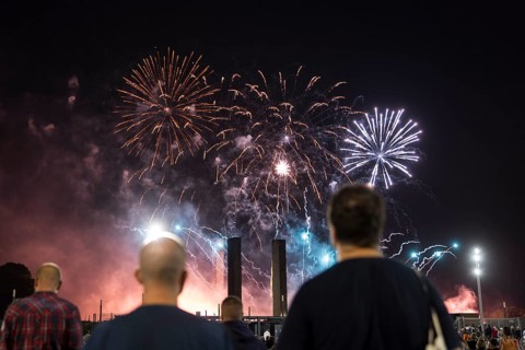 Spectators watch the fireworks at the Pyronale on the Maifeld at the Olympic Stadium, Berlin,