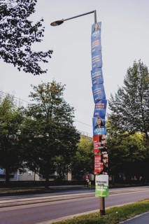 Election posters hanging from a lamppost, taken in Dresden, 31 August 2024. A new state parliament