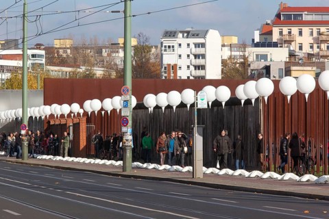 To mark the 25th anniversary of the fall of the Berlin Wall, illuminated balloons symbolise the