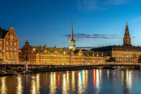 The former Børsen stock exchange on Holmens Canal at dusk, Copenhagen, Denmark, Europe