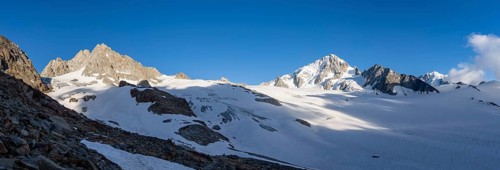 Panorama high alpine mountain landscape, summit of Aiguille de Chardonnet and Aiguille de Tour,