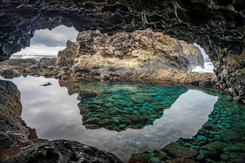 Lava cave with natural swimming pool at Charco Azul, El Hierro, Canary Islands, Spain, Europe