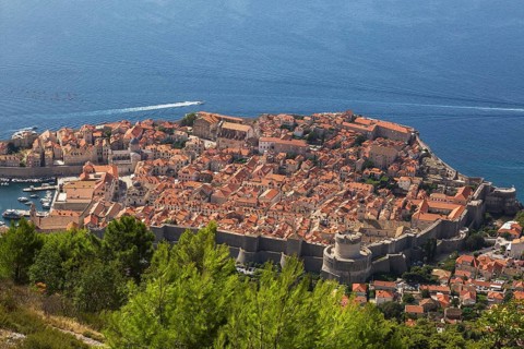 High angle view of old walled city of Dubrovnik with traditional terracotta clay tile rooftop