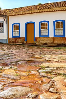 Cobblestone street and colonial architecture houses in the historic city of Tiradentes in Minas