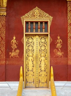 Ornate door at Wat Sensoukaram, Luang Prabang, Laos, Asia