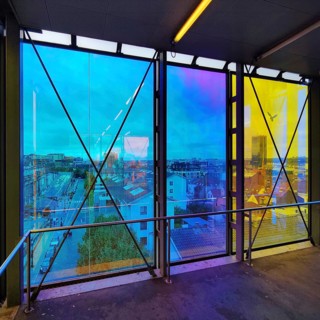 Marollescenece, art installation The Cube, coating of the windows with translucent dichroic films,