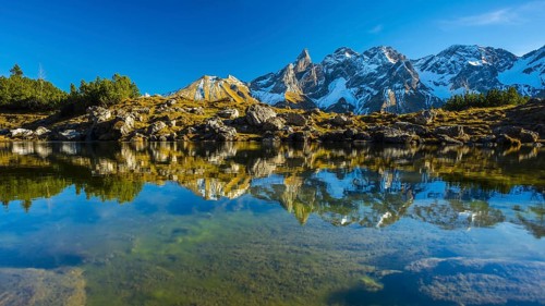 Panorama of Lake Gugger See, central main ridge of the Allgäu Alps, Allgäu, Bavaria, Germany,