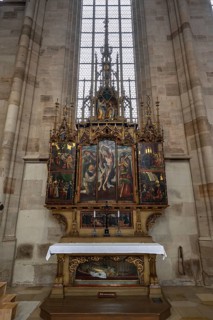 Sebastian altar, dated 1520-1530, in the late Gothic hall church of St George, Dinkelsbühl,