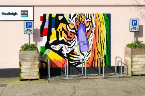 Tiger street art mural on wall of Suffolk Building Society office, Hadleigh, Suffolk, England, UK