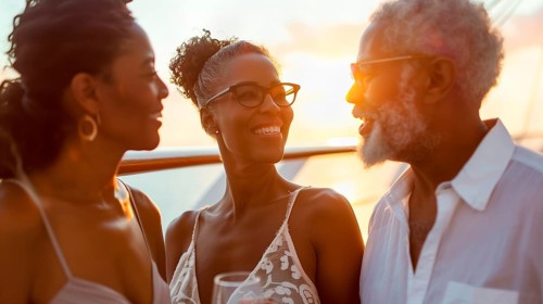 African american friends enjoying cocktails on the deck of a luxury cruise ship. generative AI, AI