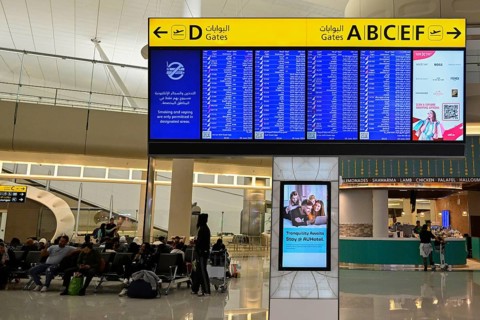 Airport scoreboard departures, Abu Dhabi, UAE