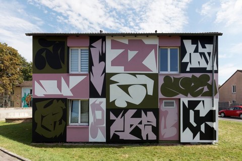 Residential building with mural by street artists Jan Herrmann and Tim Schmeer, façade completely