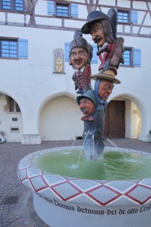 Fool's fountain by Egon Leeuw 1989 in front of the Buchauer, Amtshaus, carnival fountain, fools,