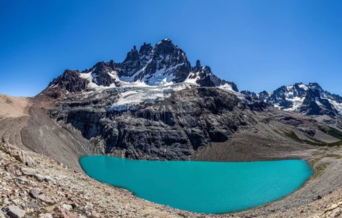 Panorama of mountain Cerro Castillo, view over lagoon, glacier and peak Cerro Castillo, nature