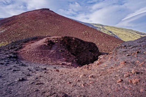 Lava rock and crater landscape around the Crateri Silvestri in the Etna National Park, Parco