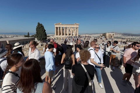 Tourists crowd the viewpoint on the Acropolis, view of Parthenon Temple, Athens, Greece, Europe