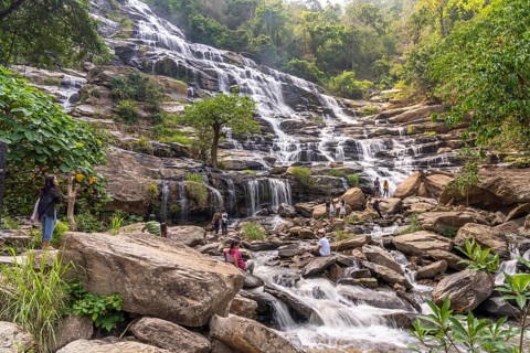 Visitors at Mae Ya waterfall in Doi Inthanon National Park near Chom Thong, Chiang Mai, Thailand,