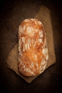 Fresh whole grain bread, rye, top view, without people