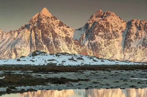Rugged mountains, Lofoten island Vestvågøya at the fjord Gimsøystraumen, Lofoten, Northern Norway,