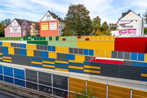 Colourful noise barriers on the A52 motorway, at the Essen-Rüttenscheid junction, the noise