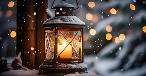 Vintage-style Christmas lantern hanging on a rustic post, covered in frost and surrounded by