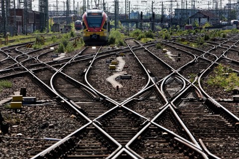 Track apron with rails, infrastructure and a local train at the main railway station, Frankfurt am