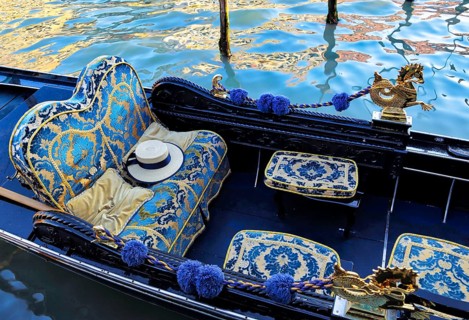 Luxury Gondola waiting for tourists near Rialto Bridge in Venice