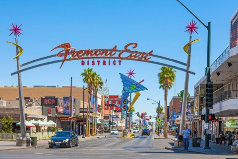 Neon Fremont East District sign on arch over Fremont Street in downtown Las Vegas, Nevada, USA,