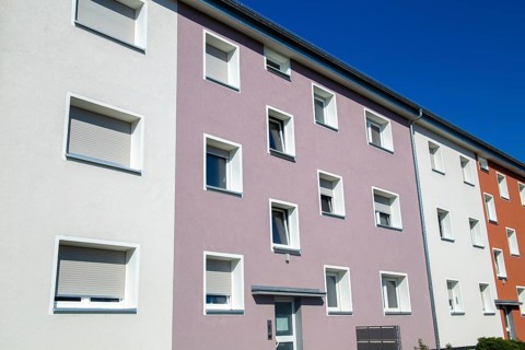 Old apartment block with new façade paint