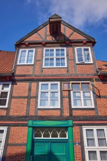 Old half-timbered house with the device for holding a pulley block in Stade, Hanseatic city,