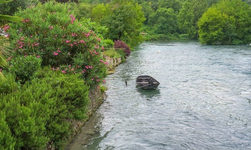 Moored rowing boat on the Mincio, Borghetto, Valeggio sul Mincio, Province of Verona, Italy, Europe
