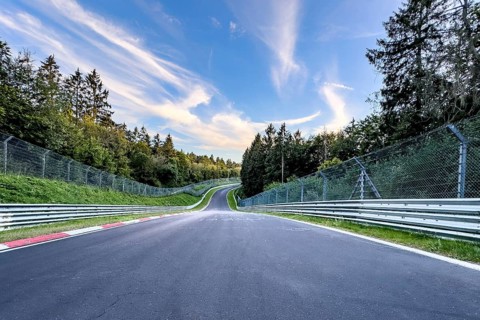View from a racing driver's perspective of the Pflanzgarten II section of the track with steep