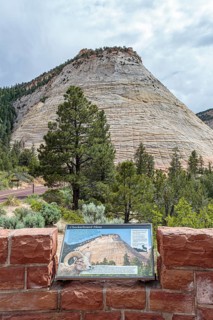 Informative sign explains the rock formations in the Checkerboard Mesa area of Zion National Park,