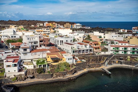 View from the Mirador El Tamaduste of the natural swimming pool and the village of Tamaduste, El