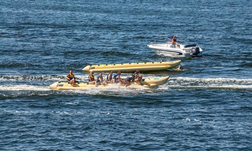 Banana boats and speedboat in Miedzyzdroje, Western Pomerania, Baltic Sea, Poland, East Europe,