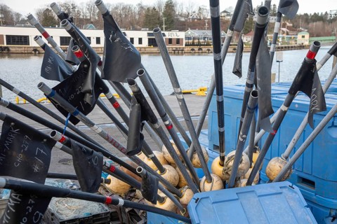 Port Stanley, Ontario Canada - Flags used to mark the location of fishing nets on a dock in Port