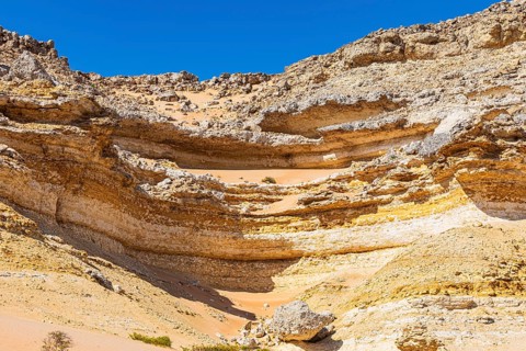 Eroded rock landscape at a fossilised reef edge, Huqf stone desert, Arabian Peninsula, Sultanate of